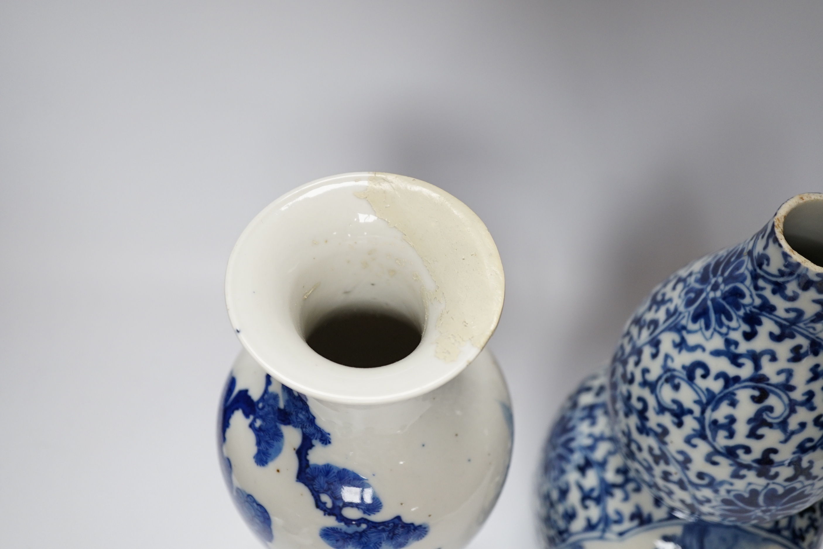 Five 19th century Chinese various sized blue and white figural vases, tallest double gourd vase 27cm high